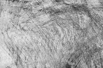 Texture of a concrete wall with cracks and scratches which can be used as a background