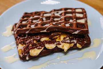 tasty Belgium waffle with organic sweets served for breakfast