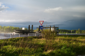 Fototapeta na wymiar Landscape with a give way sign