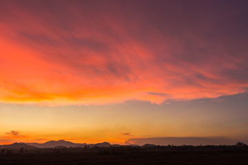 Fototapeta na wymiar sunset sky over mountain countryside 