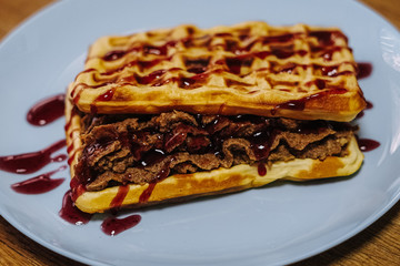 tasty Belgium waffle with organic sweets served for breakfast