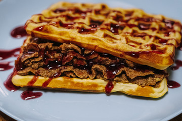 tasty Belgium waffle with organic sweets served for breakfast