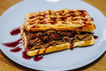 tasty Belgium waffle with organic sweets served for breakfast