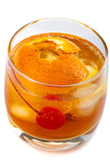 old fashion cocktail in a glass of rox on a white background