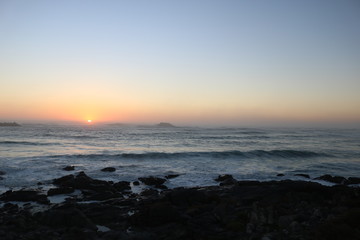 Fototapeta premium Sunrise over the sea. West Coast, Western Province, South Africa