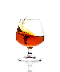 Glass glass with whiskey on a white highlighted background