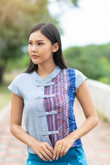 Portrait of Asian woman in native thai dress.