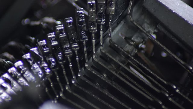 Typo keys of a old qwerty typewriter writing