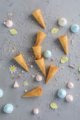 empty ice cream cones gray background. Top view