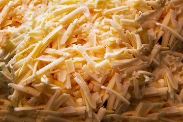 grated cheese, top view, background