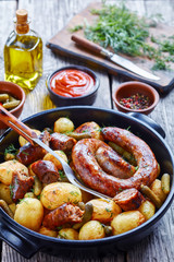 Oven-roasted spiral pork sausage with new potato