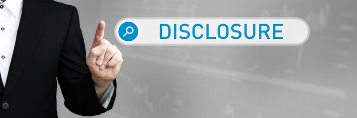 Disclosure. Businessman (Man) in a suit pointing with his finger to a search box. The word is in focus. Blue Background. Business, Finance, Statistics, Analysis, Economy