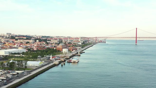 view of Lisbon's waterfront with people practicing sports , Portugal
