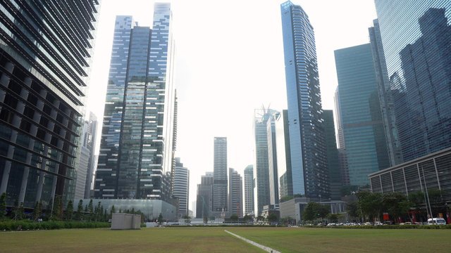 Large Open Green Space In City Center Of Singapore With Skyline And Skyscrapers