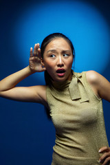 Woman trying to get a clearer tone