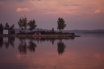 Early morning on the lake Turgoyak , Russia