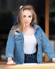 Blonde model posing at the city