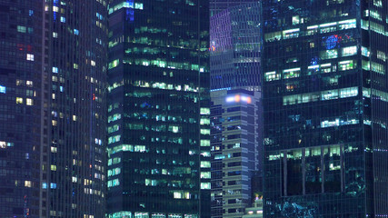 Exterior Establishing  Of Modern Office Skyscraper Buildings At Night