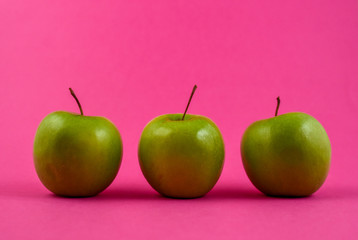 apple on purple background