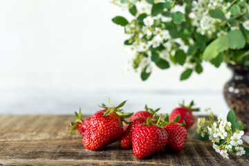 Fresh red aromatic wholesome summer berry. Strawberry. The concept of a healthy diet and agriculture.