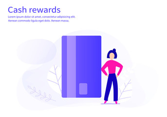 Woman with laptop makes online shopping on a big credit card Credit card icon.