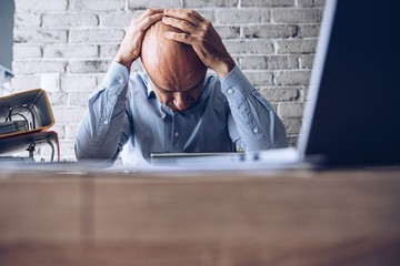 Nervous upset man with financial problems. Depressed man and financial crisis.
