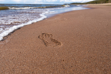 Footprint in the sand from shoes