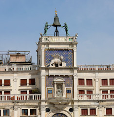 Bell Tower with statues called Due Mori in Venice in Italy