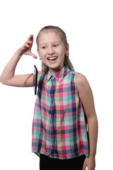 Cute little girl drops a mobile phone.