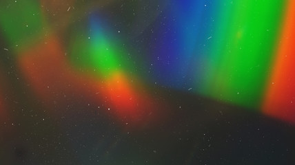 Rainbow Lens Optical Flare Film Dust Overlay Effect Vintage Abstract Bokeh Light Leaks Photo Retro Camera Defocused Blur Reflection Bright Sunlights. Use Screen Overlay Mode for Photo Processing.