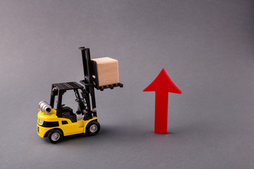 Photo of loader delivering bringing wooden cube supply management arrow pointing up sales start-up strategy isolated over dark pastel grey color background