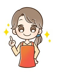 エプロンの女性 指さし 笑顔
