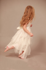 little girl in a white dress