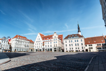 Fototapeta na wymiar architecture and urban concept - empty town hall square of Tallinn old city, estonia