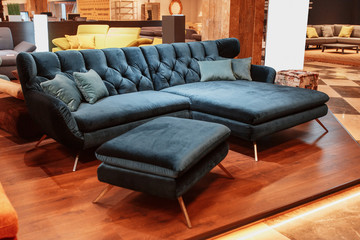 modern furniture, blue sofa with pillows sold in the store