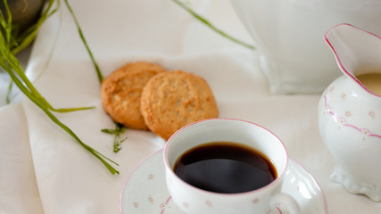 coffee with cookies on the table