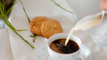 coffee with cookies on the table