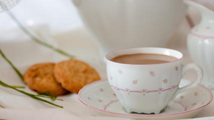 coffee with cookies on the table