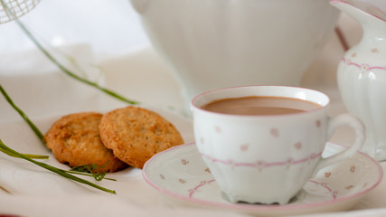 coffee with cookies on the table