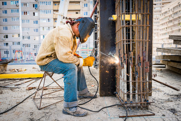 a welder makes a structure out of metal