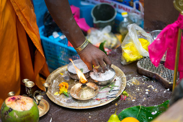 hands monk who  makes the sacred rite of the Indian festival