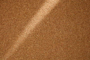 Shadow Line From the Window on Cork Board. Cork  background with blinds light and shadow