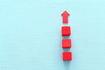 Business leadership concept, red arrow leader with group of followers