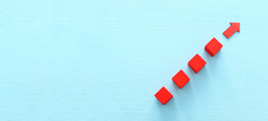 Business leadership concept, red arrow leader with group of followers