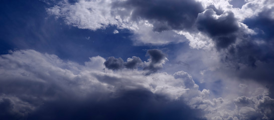 Rich and pretty clouds on a bright Sunny day in a blue sky