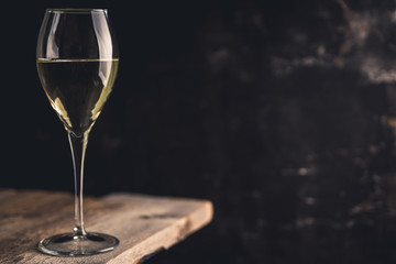 White wine on the rustic background. Selective focus. Shallow depth of field.