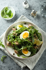 Arugula salad with tuna and egg