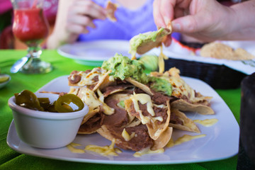 people eating nachos