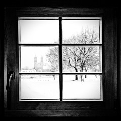 Trees In Winter Seen Through House Window
