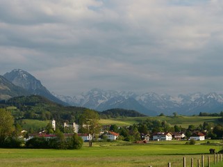 Fototapeta na wymiar mountains and a village against sky